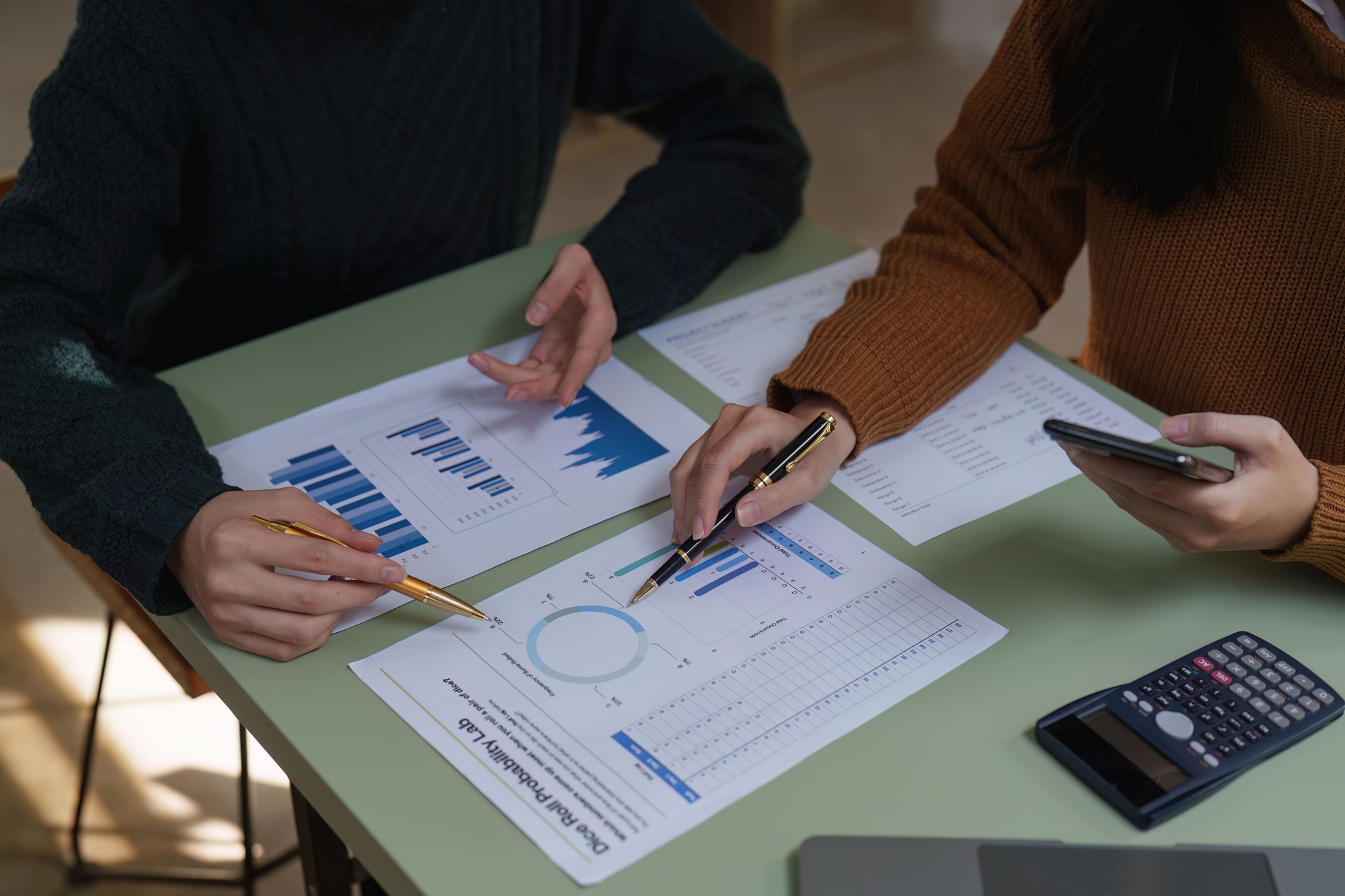 Asian business advisor meeting to discuss and analyze and the situation on the financial report in the meeting room. Fund Investment and accounting concept